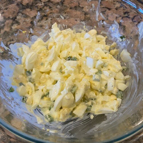 image shows spicy egg salad recipe ingredients mixed together and ready to eat