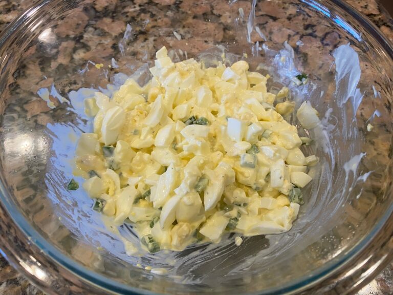 image shows spicy egg salad recipe ingredients mixed together and ready to eat