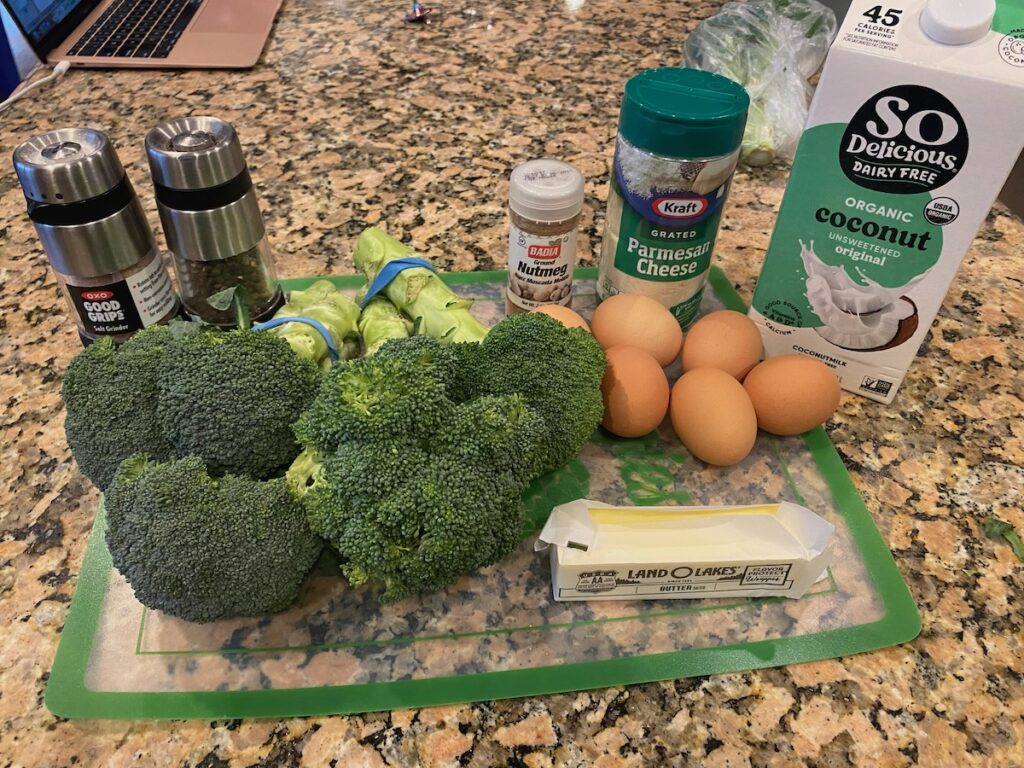 image shows ingredients for the crustless broccoli quiche on kitchen island