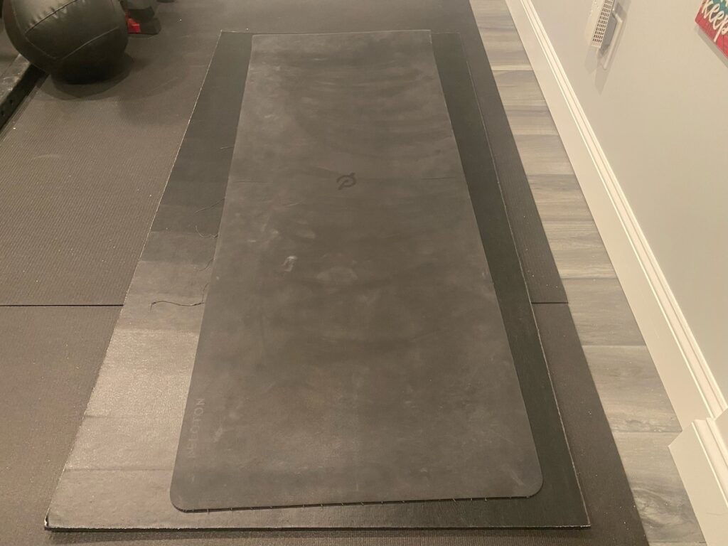 image shows yoga mat set up at home