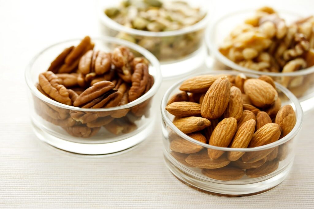 nuts in containers are healthy snack prep for busy moms