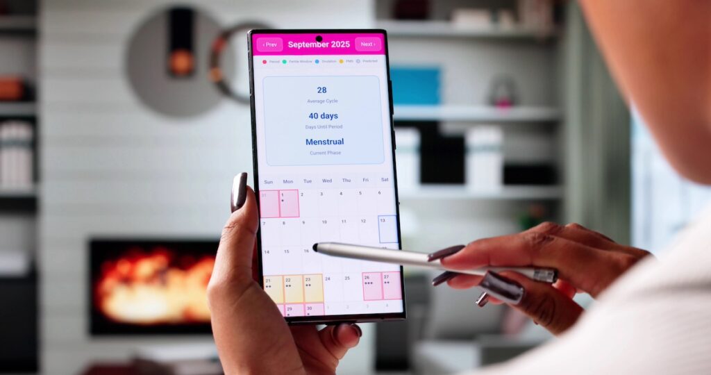 woman tracking hormones and energy levels in a cycle app