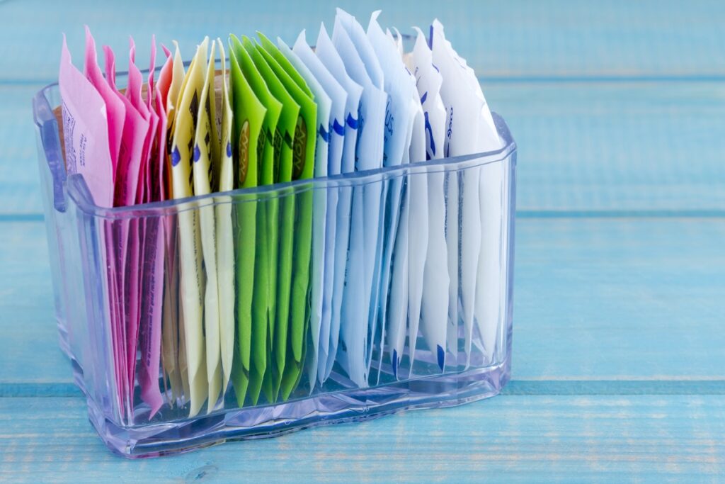 Artificial sweetener packets and real sugar packets